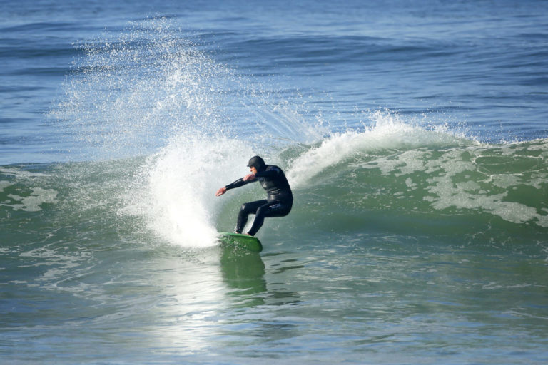 Surfing at Salmon Creek. (Conner Jay/The Press Democrat)
