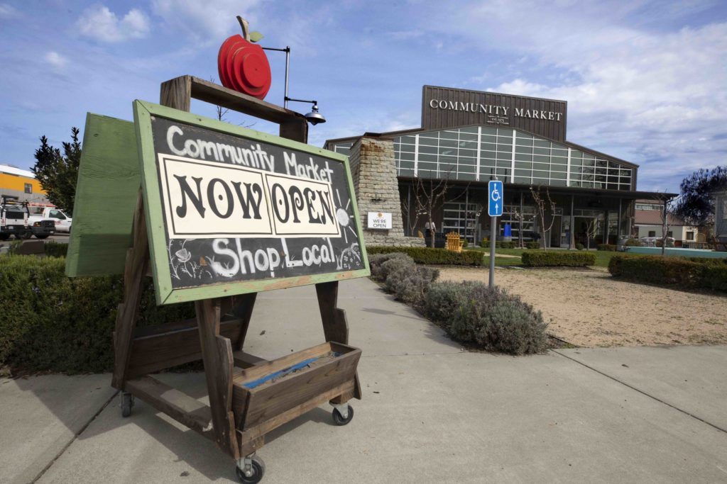 The Community Market opened for business on Monday morning after flooding in Sebastopol's Barlow district forced the store to close more than four weeks ago. (photo by John Burgess/The Press Democrat)