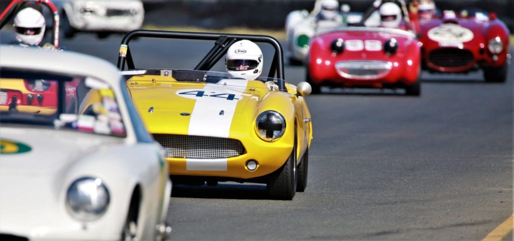 A pack of pre-1963 racecars compete in one of 9 qualifying rounds on Saturday October 6th at the Charity Challenge Vintage races at Sonoma Raceway. (Photo Will Bucquoy/ For the PD).