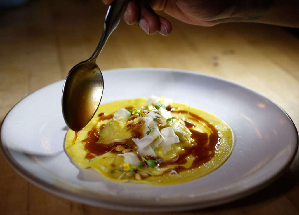 Ricotta-short rib raviolo in vegetable ragout at Della Fattoria in Petaluma, California, on Thursday, August 23, 2018. (Alvin Jornada / The Press Democrat)