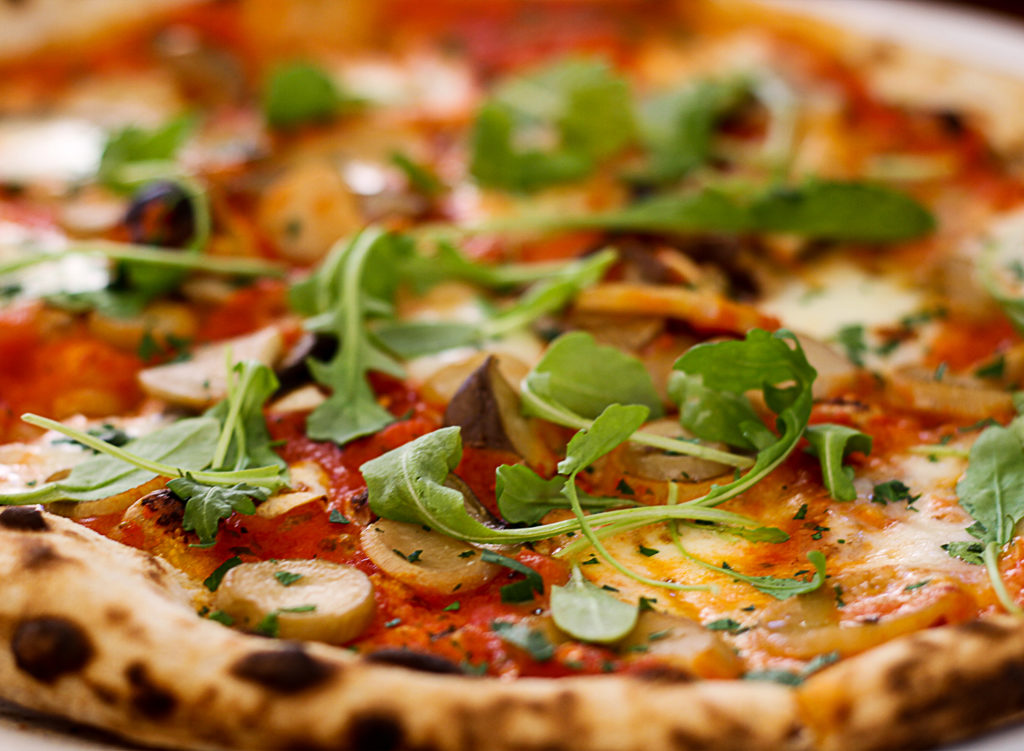 Campo Fina, Healdsburg Campo Fina’s wood-fired pizza and other delicious Italian delights are best enjoyed on their relaxing, spacious patio. The menu doesn’t shy away from bold flavors like anchovy and aromatic herbs. Campo Fina’s wine list is excellent, with a nearly equal selection of local choices and Italian gems. Wine lovers will be pleased to see less-represented regions of Italy on the list, including wines from Marche, Liguria and Campania. Photo Credit: Heather Irwin