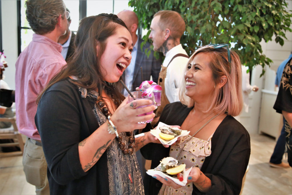 Maria Belzunce and Jeanny Dickinson enjoy appetizer's at the Grand Reopening of MacArthur Place in Sonoma California, Thursday August 1, 2019. (Photo Will Bucquoy/For Sonoma Magazine).