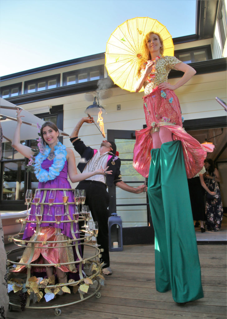 Josselyn Maquette, from left, Tobias Weinberger and Krysta Cook entertain guests at the Grand Reopening of MacArthur Place in Sonoma California, Thursday August 1, 2019. (Photo Will Bucquoy/For Sonoma Magazine).