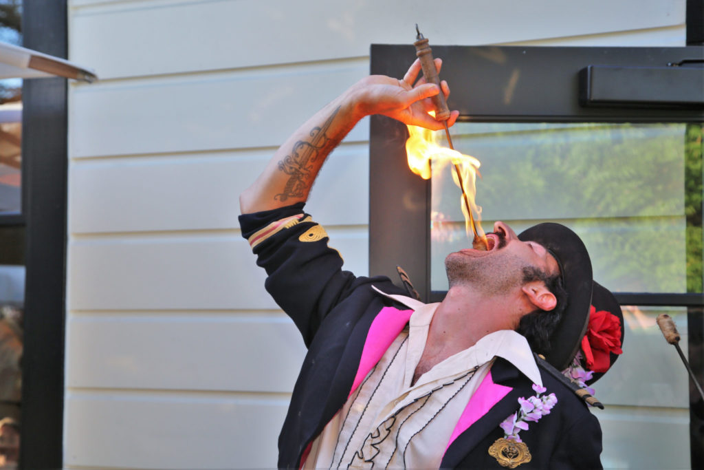Sword swallower, Tobias Weinberger, entertains guests at the Grand Reopening of MacArthur Place in Sonoma California, Thursday August 1, 2019. (Photo Will Bucquoy/For Sonoma Magazine).