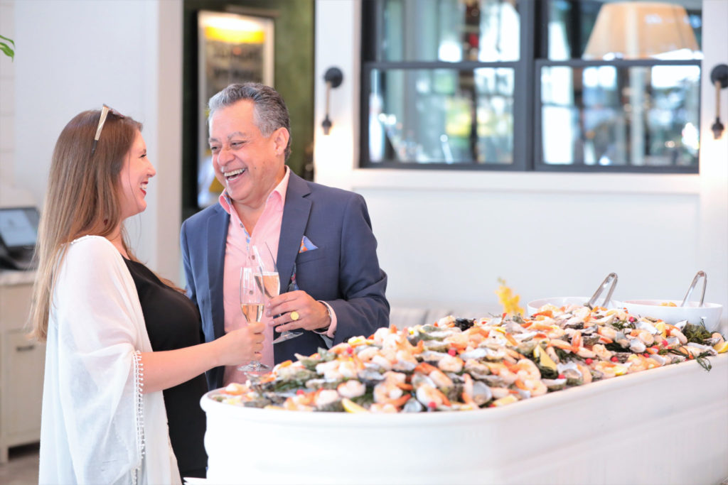 Emily Charrier and Manual Merjil help celebrate at the Grand Reopening of MacArthur Place in Sonoma California, Thursday August 1, 2019. (Photo Will Bucquoy/For Sonoma Magazine).