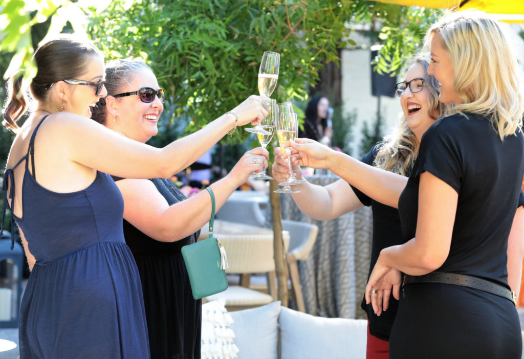 Nicole Grimes, (from left), Amy Grimes, Barbara Hodgkinson and Maryssa Souza toast at the Grand Reopening of MacArthur Place in Sonoma California, Thursday August 1, 2019. (Photo Will Bucquoy/For Sonoma Magazine).