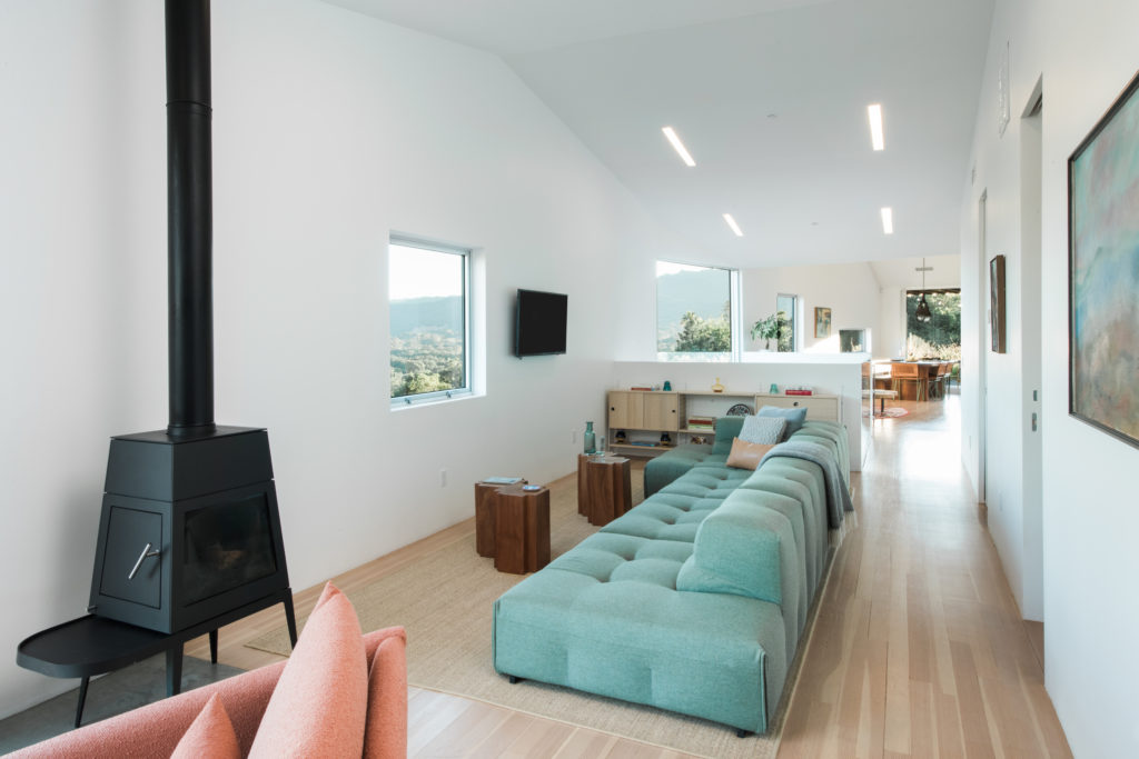 B&B Italia Sofa --we chose colors that complemented the exterior colors of the property as well as the art by both of our mothers. Abstract painting on right created by Hollie's mom.