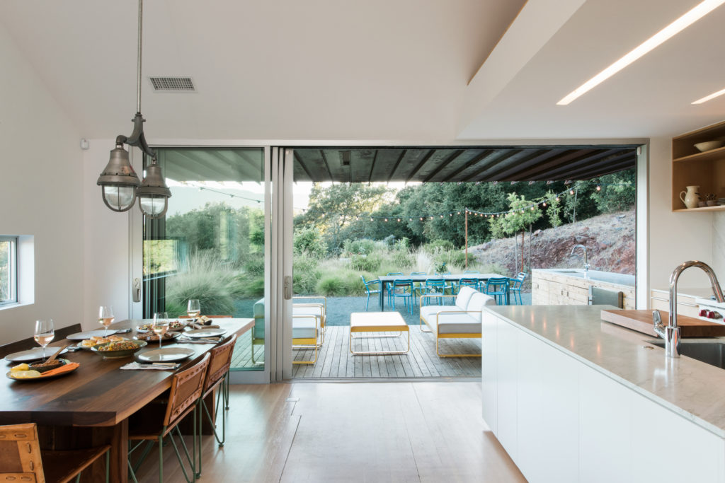 The sliding windows create a wonderful indoor/ outdoor living experience.