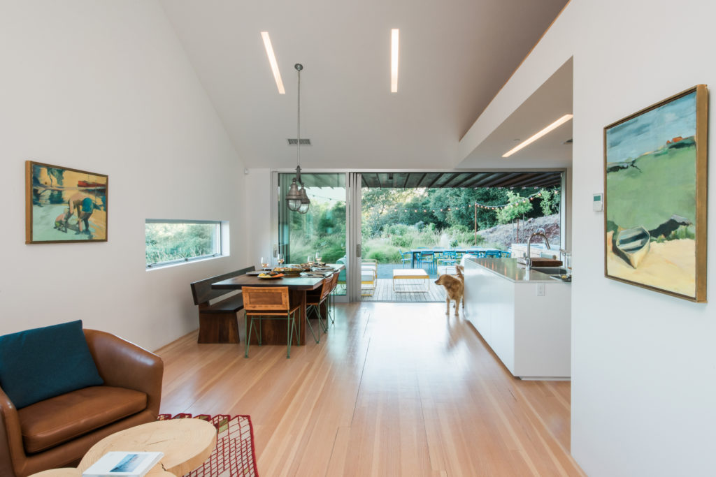 Both paintings pictured are works by Jim's mom.