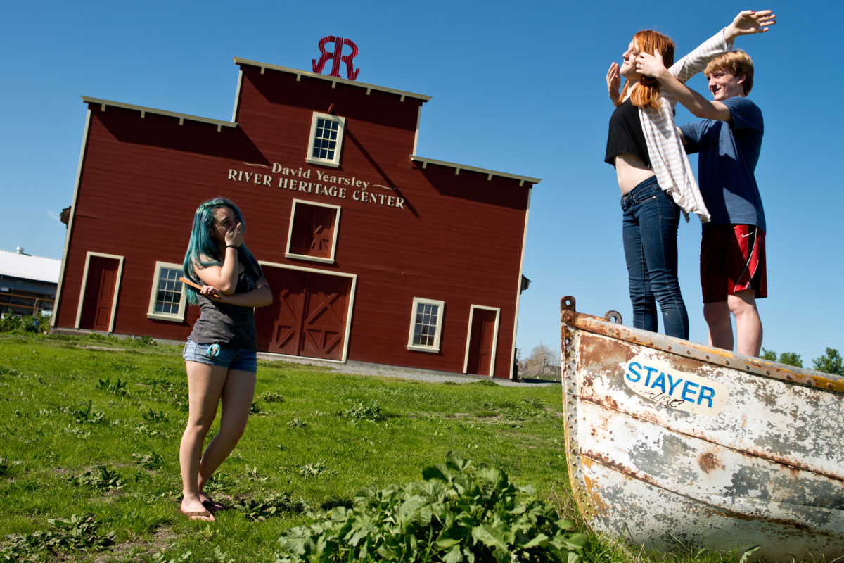 Oriah North, 14, left, watches her classmates Chynna Hess, 13, and Ethan Paisley, 13, reenact a scene from the movie "Titanic" as they hang out by the David Yearsley River Heritage Center beside the Petaluma River in Petaluma, Calif., on March 15, 2014. (Alvin Jornada / The Press Democrat)