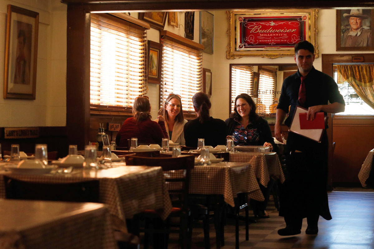 Friends from college, from left, Rebecca Cruise, Stephanie Egbers-Meyers, Katie Jones, and Margaret Galileo reunite to catch up over dinner and celebrate birthdays at Dinucci's Italian Dinners in Valley Ford, California, on Thursday, May 31, 2018. (Alvin Jornada / The Press Democrat)