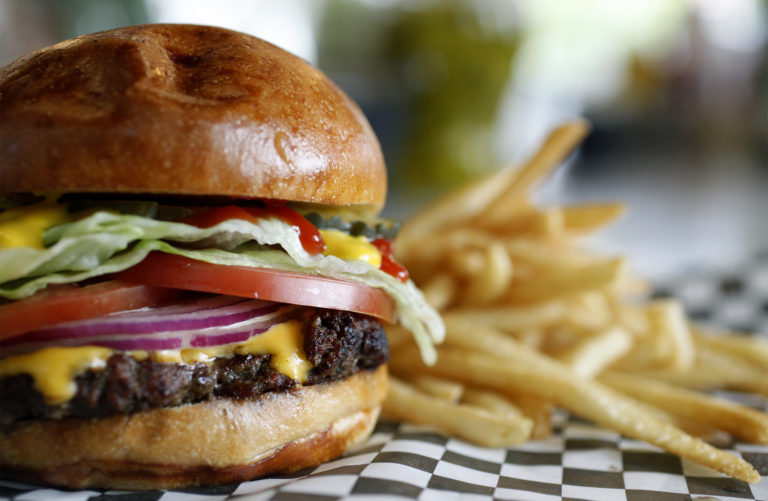 A cheeseburger and fries from Superburgeer. (Beth Schlanker / The Press Democrat)