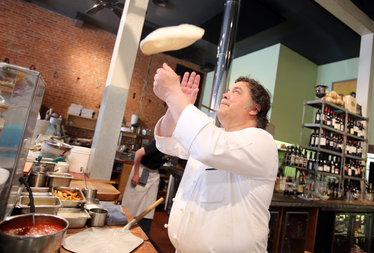 Chef Tony Najiola makes a Red Pizza at Central Market in Petaluma. (Crista Jeremiason/The Press Democrat)