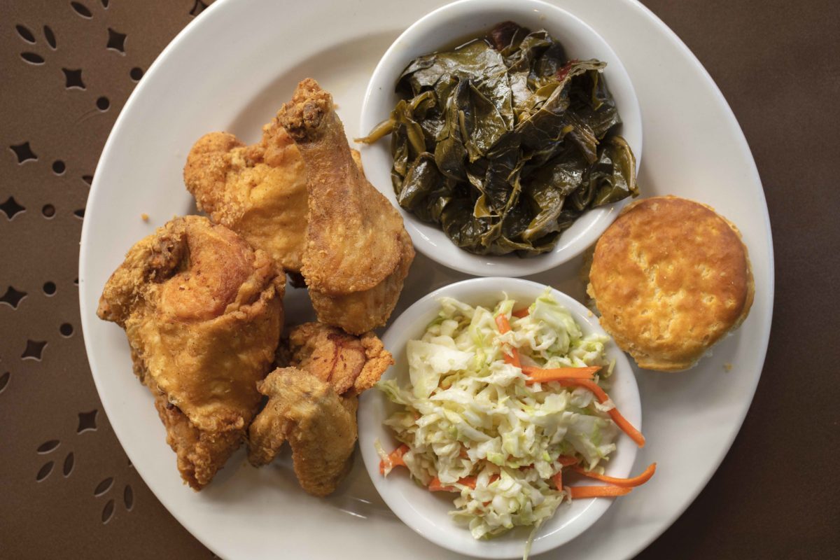 Southern Fried Chicken with garlic smashed potatoes, slaw, braised greens and a biscuit from Sweet T's Restaurant + Bar in Windsor. (John Burgess/The Press Democrat)