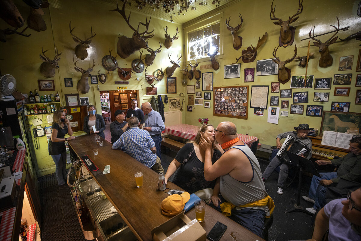 The bar at Volpi's Italian Restaurant in Petaluma was back in action after a year's hiatus since the start of the pandemic with accordion music, loud Italian songs and kissing at the bar on Thursday, May 6, 2021. (Photo by John Burgess/The Press Democrat)