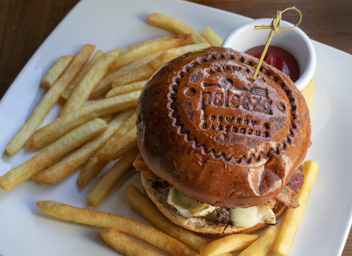The Brie & Bacon Burger with caramelized onions, and apple aioli from Palooza Brewery and Gastropub in Kenwood. (photo by John Burgess/The Press Democrat)