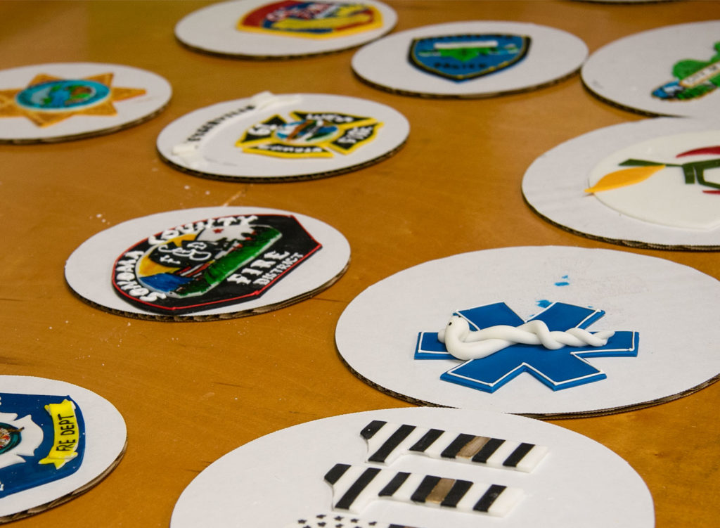 Details of a Kincade Fire first responders' cake created by Costeaux Bakery's Karah Williams, Nerissa Sutton, Silva Nunez and Dioselena Madrano in Healdsburg. Heather Irwin/PD