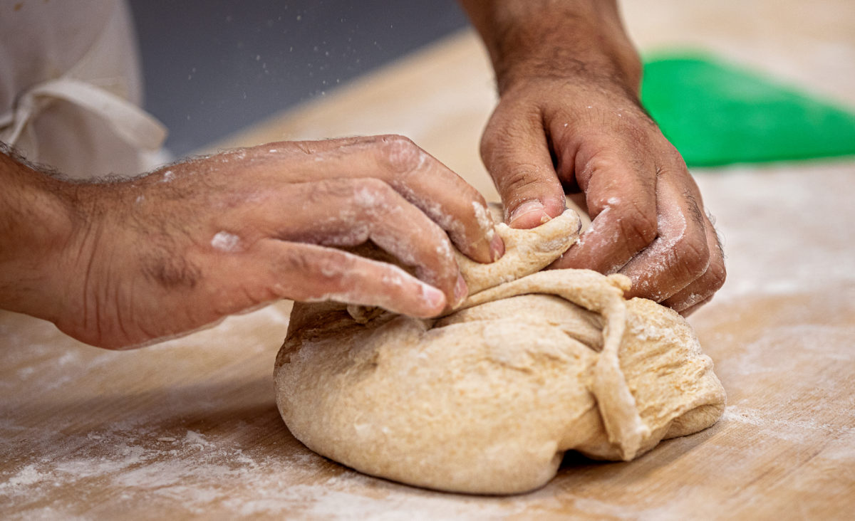 Folding ciabatta dough at Central Milling