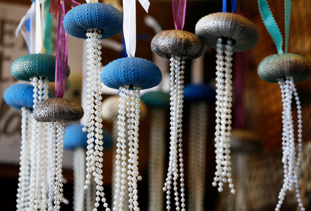 Sea Urchin Creations by Charmaine on display with other handmade goods at Gin'gilli's Vintage Home in Geyserville, California, on Tuesday, July 30, 2019. (Alvin Jornada / The Press Democrat)