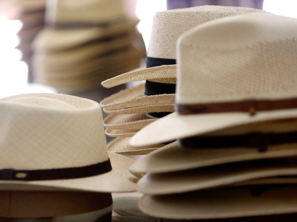 New hats for sale are displayed at the Bosworth Store, which functions as an apparel retail store, hat servicing shop, the town museum, as well as the business office for the Olive Hill Cemetery, in Geyserville, California, on Friday, August 17, 2018. (Alvin Jornada / The Press Democrat)