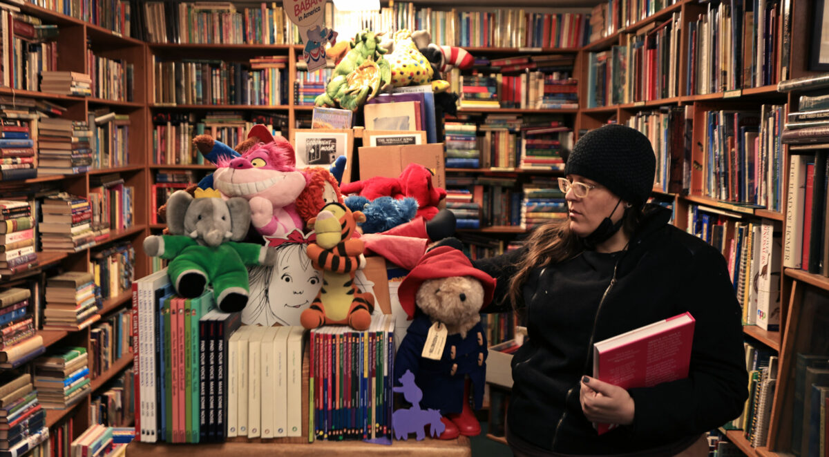 Lygia Burns from Santa Rosa looks for a particular children's book at Treehorn Books in downtown Santa Rosa, Tuesday, Oct. 31, 2023. (Kent Porter / The Press Democrat)