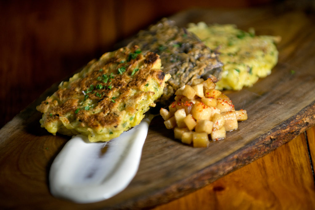 Yukon gold and purple potato latkes prepared by chef Daniel Kedan at Backyard restaurant in Forestville. (Alvin Jornada / The Press Democrat)