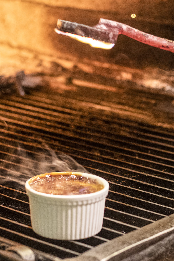 Creme brulee is “branded” with a hot iron at K&L Bistro in Sebastopol. Heather Irwin/PD