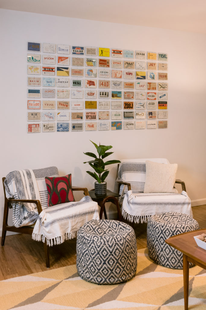 Family room with call card collection. Melissa found this collection at an estate sale.