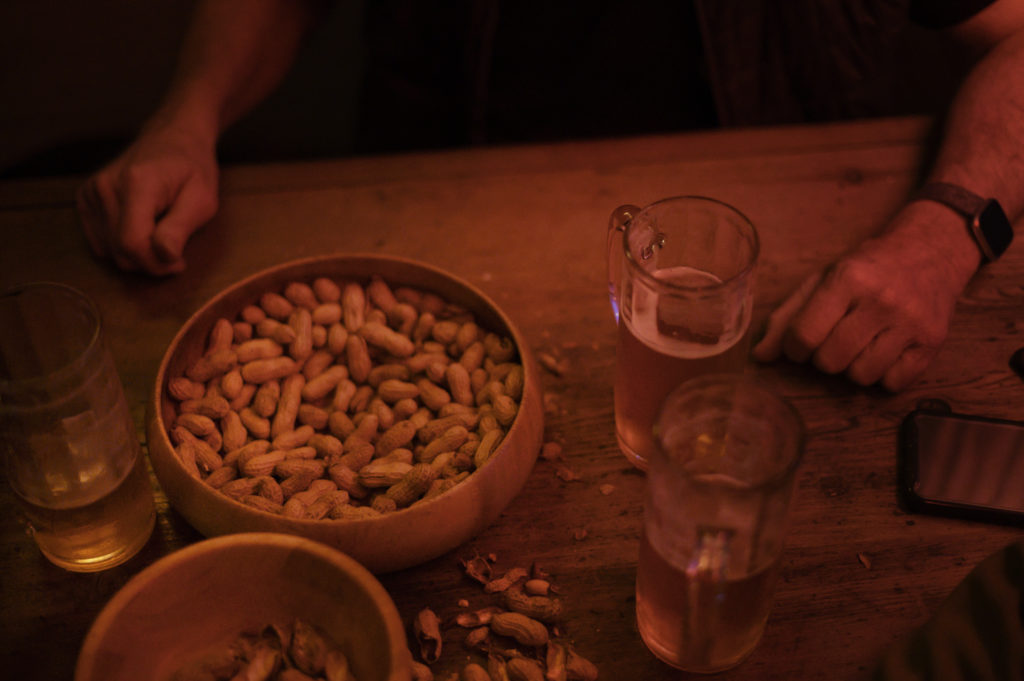 Peanuts and beer at Ernie's Tin Bar on Lakeville Highway in Petaluma, California. November 22, 2019. (Erik Castro)