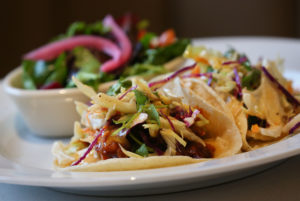 Pulled Pork Tacos, at Picazo Kitchen & Bar, feature home braised puled pork, coleslaw, cilantro, red pickled onions, and is served with baby salad. (Christopher Chung/ The Press Democrat)