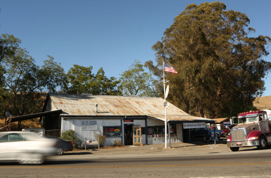 Traffic along Highway 116 passes by Ernie's Tin Bar in Petaluma on Thursday, July 18, 2013. (Conner Jay)