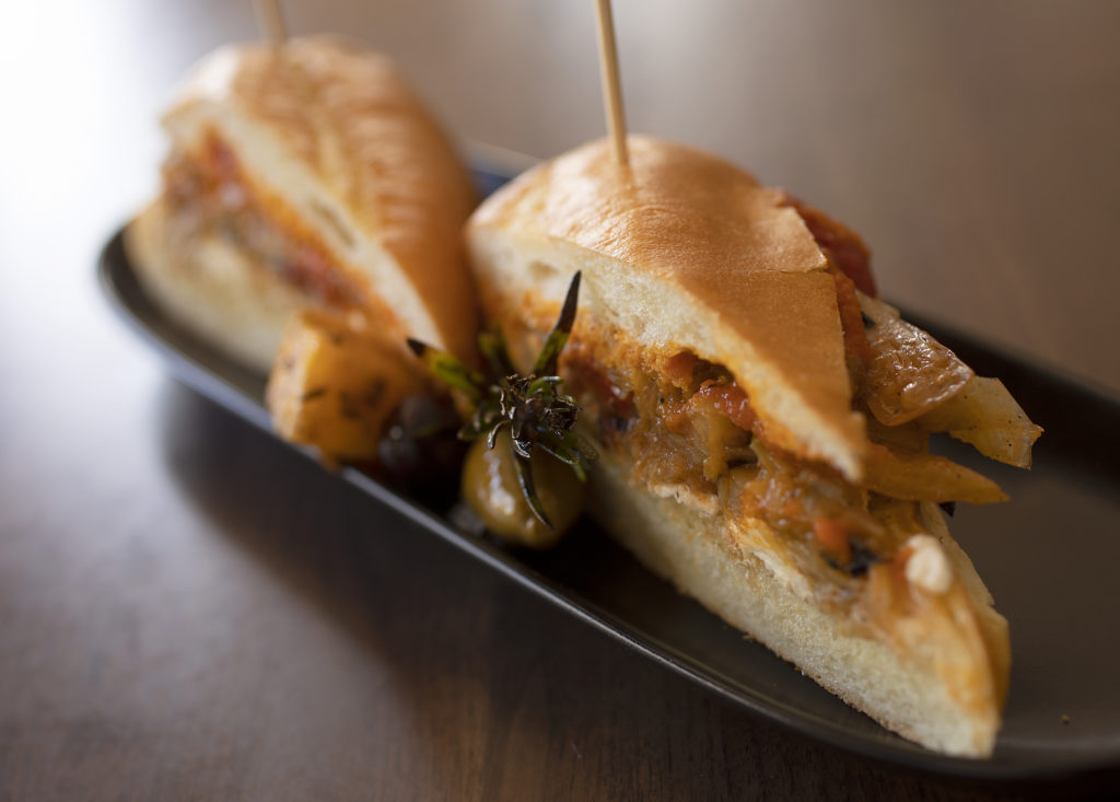 La Federica Bocadillo (Spanish baguette sandwich) with marinated vegetables, soffits and goat cheese from Gerard's Paella Y Tapas in downtown Santa Rosa. (John Burgess)