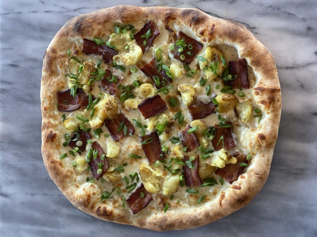 Pizza champion Leah Scurto will be opening PizzaLeah at Bell Village in Windsor this March. As a member of the US Pizza Team, she’s won several pizzaiolo competitions with pies like “Old Grey Beard” with house made sausage, chilies, Mike’s Hot Honey and candied orange peel or simple “grandma” style pan pizzas with pepperoni and mushrooms.