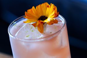 The Oakland cocktail, at Whisper Sisters, consists of tequila, mezcal, cinnamon, port, grapefruit, and banana. (Christopher Chung/ The Press Democrat)