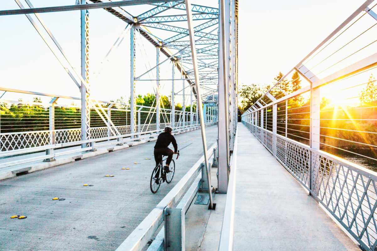 Biking across Memorial Bridge in Healdsburg. (Kim Carroll)