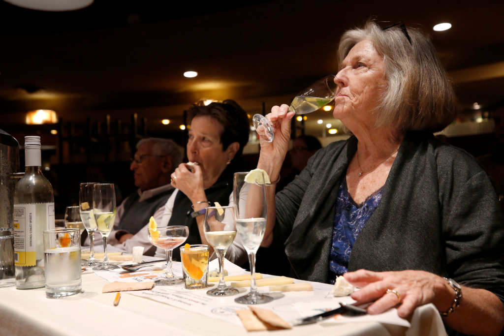 Kimberly Kroener, right, and Stephanie Narang of Lincoln taste a pairing of a lemon basil drop cocktail with a Petite Supreme brie from Marin French Cheese, during the 13th annual California Artisan Cheese Festival at the Flamingo Resort and Conference Center in Santa Rosa, California, on Saturday, March 23, 2019. (Alvin Jornada / The Press Democrat)