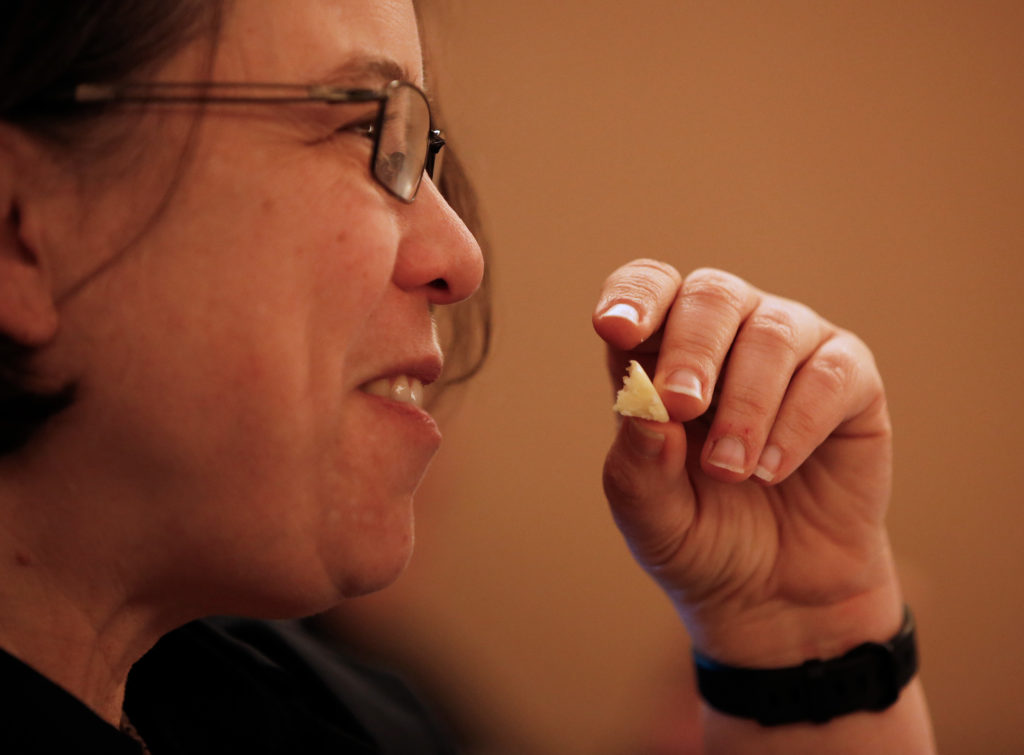 Julie Schreiber of Healdsburg tastes a traditional cheese curd from Wm. Cofield Cheesemakers during a cheese science seminar with the Cheese Twins, Michael and Charlie Kalish at the 13th annual California Artisan Cheese Festival at the Flamingo Resort and Conference Center in Santa Rosa, California, on Saturday, March 23, 2019. (Alvin Jornada / The Press Democrat)