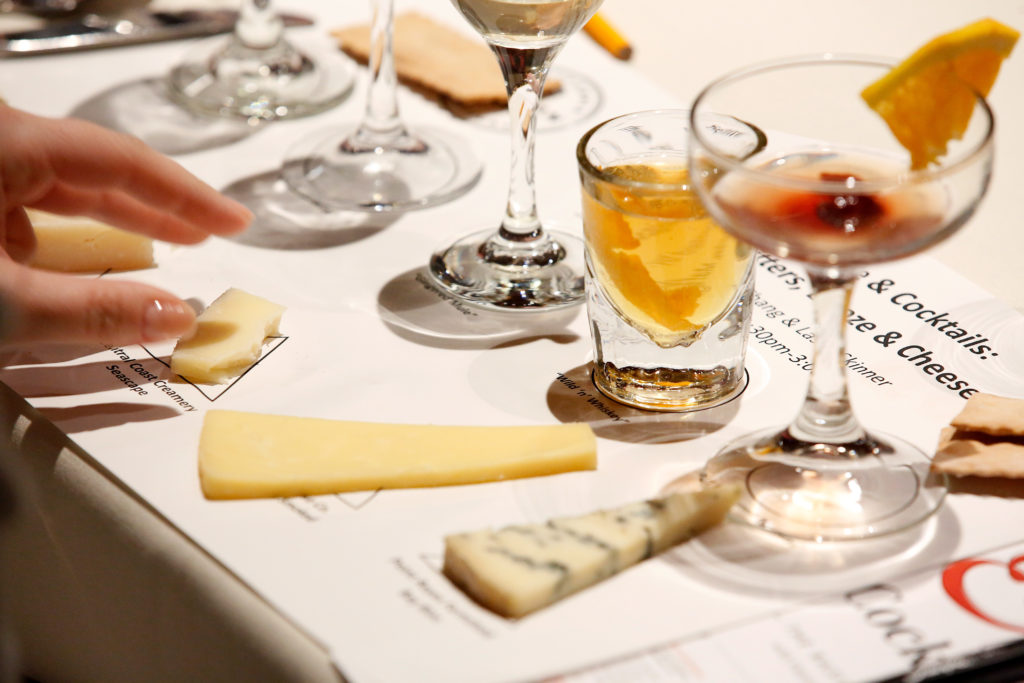 An attendee tastes a Seascape gouda from Central Coast Creamery that is paired with a gingered mule cocktail during a seminar pairing cocktails and aromatic bitters with cheese, at the 13th annual California Artisan Cheese Festival at the Flamingo Resort and Conference Center in Santa Rosa, California, on Saturday, March 23, 2019. (Alvin Jornada / The Press Democrat)