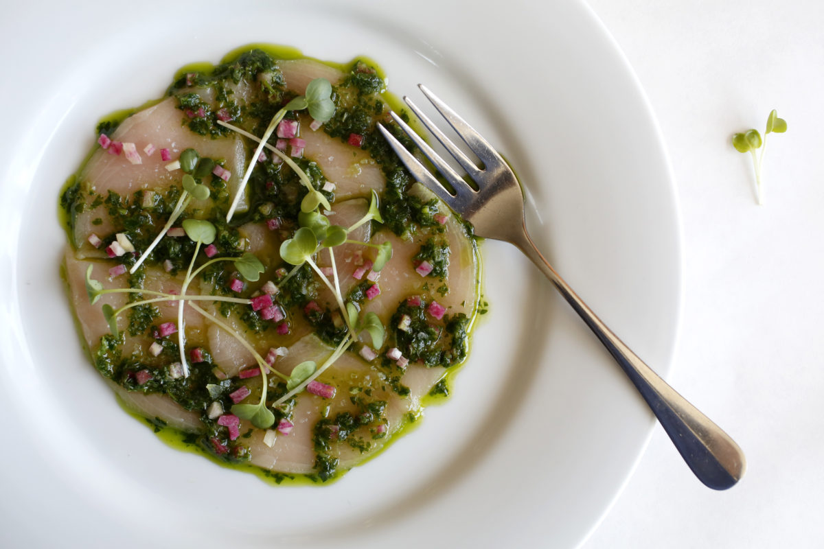 The Hamachi crudo with a parsley and radish salsa, horseradish, lemon juice, olive oil and sprouted watercress at Terrapin Creek restaurant in Bodega Bay, on Thursday, June 18, 2015. (BETH SCHLANKER/ The Press Democrat)