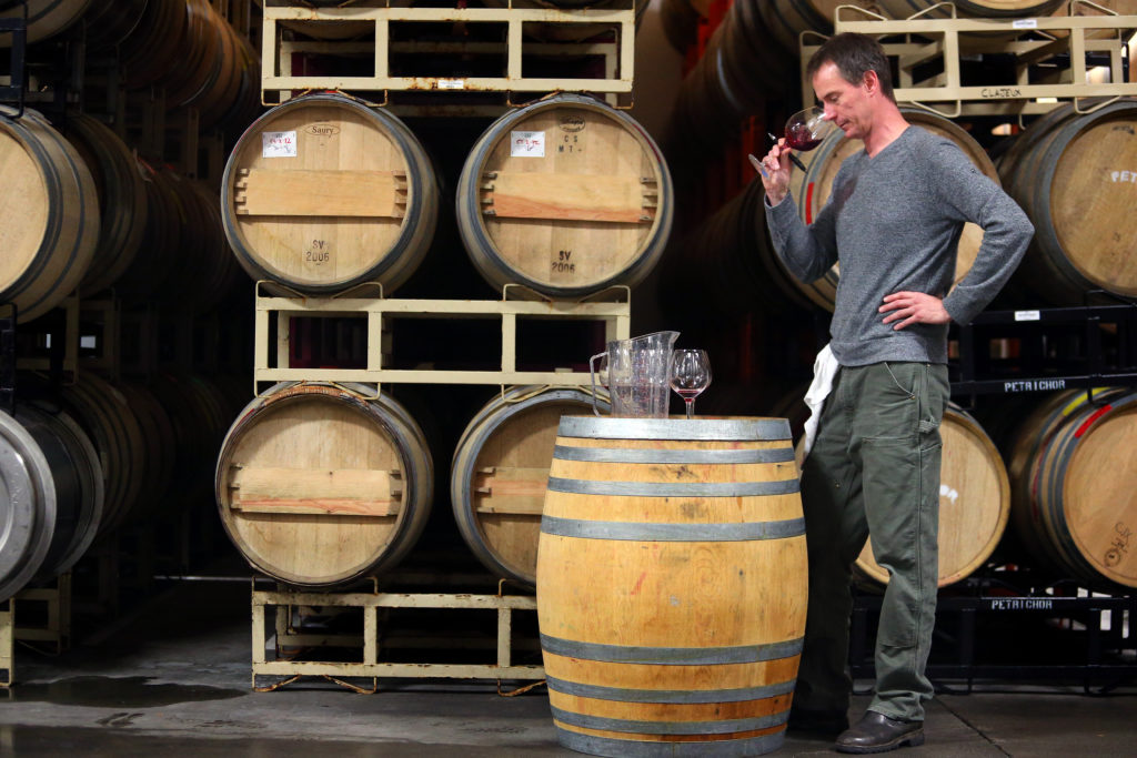 3/26/2014:D3: Alan Baker, owner and winemaker of Cartograph Wines, blends wine at Punchdown Cellars, in Santa Rosa. PC: Alan Baker, owner and winemaker of Cartograph Wines, blends wine at Punchdown Cellars, in Santa Rosa on Thursday, March 6, 2014. Baker went through the Sonoma State University Wine Business Institute's Wine Entrepreneurship class. (Christopher Chung/ The Press Democrat)