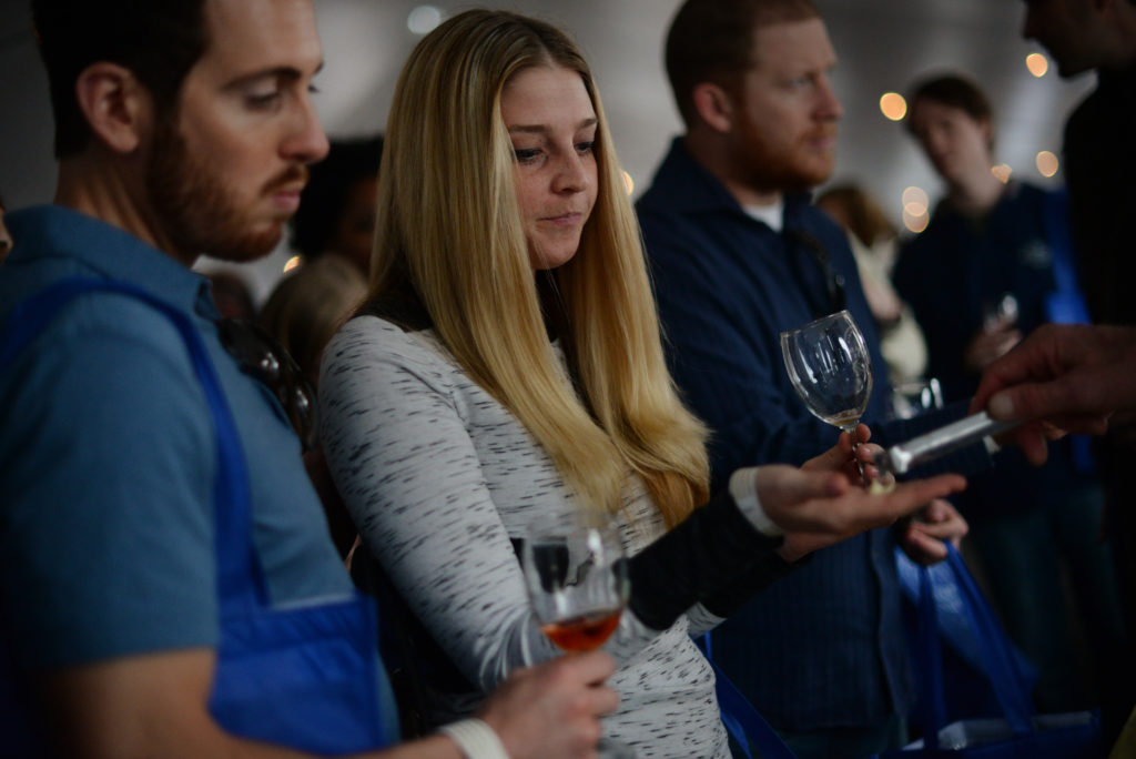 Michael Vollmer, left with Chelsea Scocca, both from Walnut Creek sampling cheeses at the the Achadinha Cheese Company's booth during the 11th annual California Artisan Cheese Festival held at the Sheraton Sonoma County in Petaluma Sunday. March 26, 2017. (Photo: Erik Castro/for The Press Democrat)