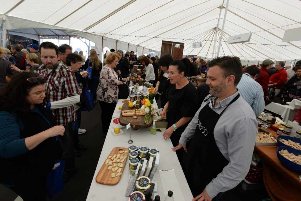 Gerard Tuck, far right, with his wife Susan Tuck of Chevoo during the 11th annual California Artisan Cheese Festival held at the Sheraton Sonoma County in Petaluma Sunday. March 26, 2017. (Photo: Erik Castro/for The Press Democrat)