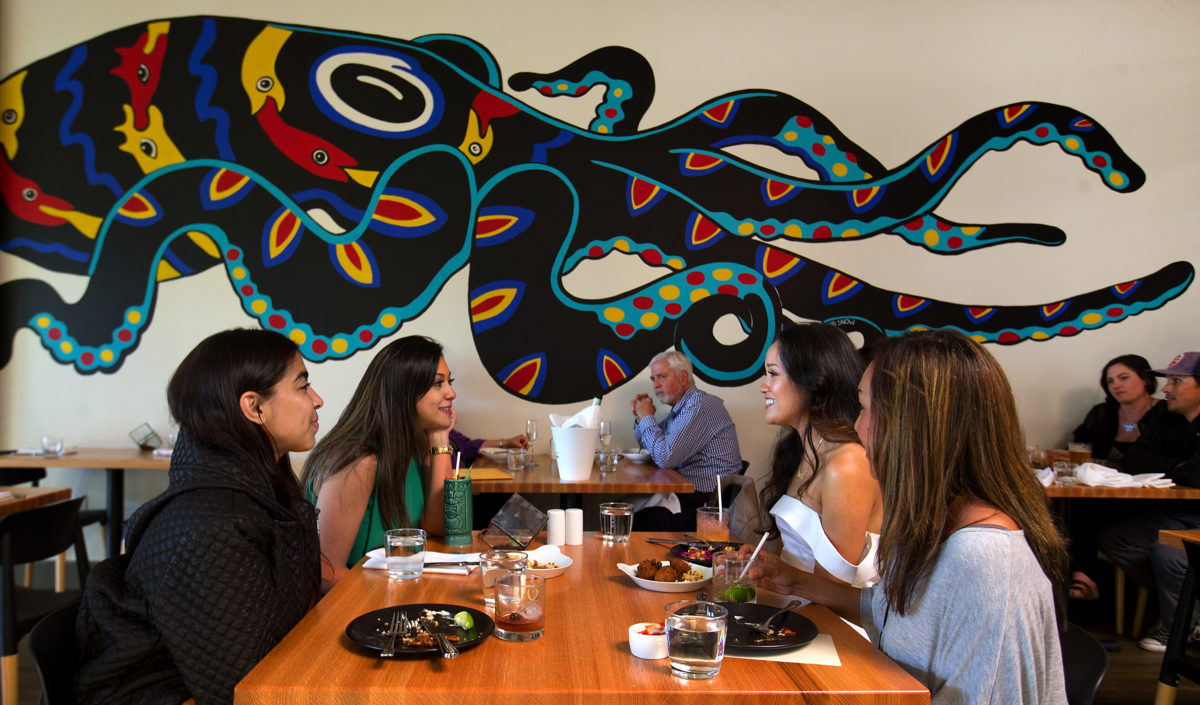 An octopus mural by Bud Snow decorates a wall of Perch + Plow on Courthouse Square in Santa Rosa. (John Burgess/The Press Democrat)