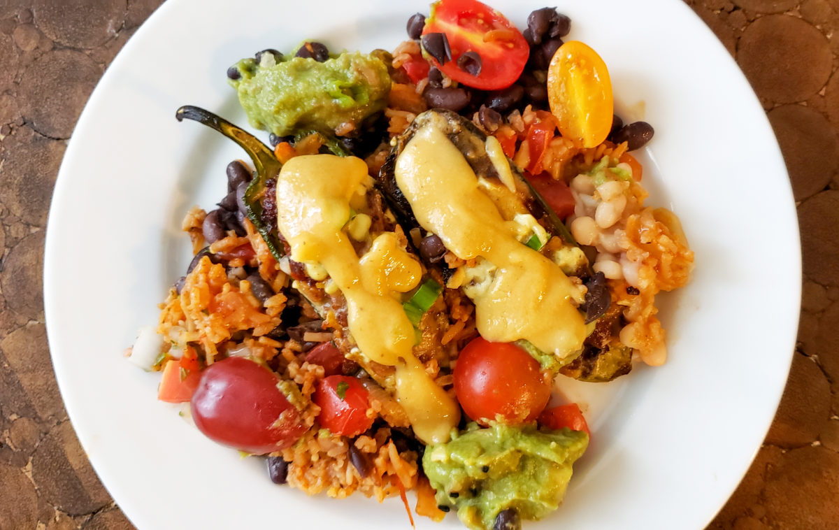 Stuffed jalapenos with Spanish rice, beans, pico de gallo and cashew cheese from Cozy Plum in Santa Rosa. (Heather Irwin/The Press Democrat)
