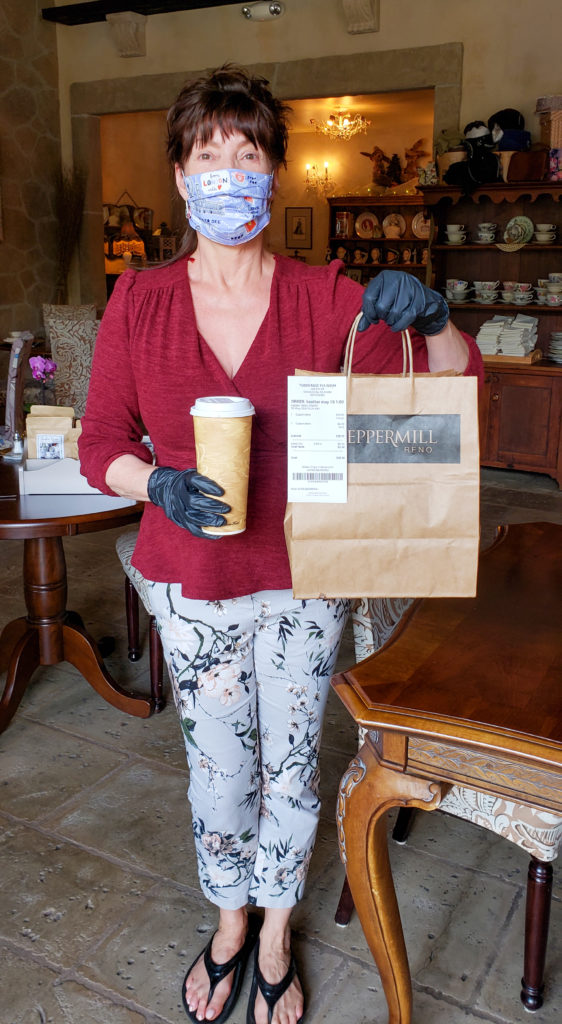 Owner Angela Grant from Tudor Rose Tea Room in Santa Rosa with my bag of goodies. Heather Irwin/PD