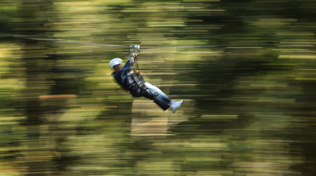 A customer of Alliance Redwoods Sonoma Canopy Tours uses the zip line, Wednesday March 28, 2018 near Camp Meeker, contributes to outdoor recreation companies employing over 4,500 workers which adds $731 million to the local economy. (Kent Porter / Press Democrat) 2018