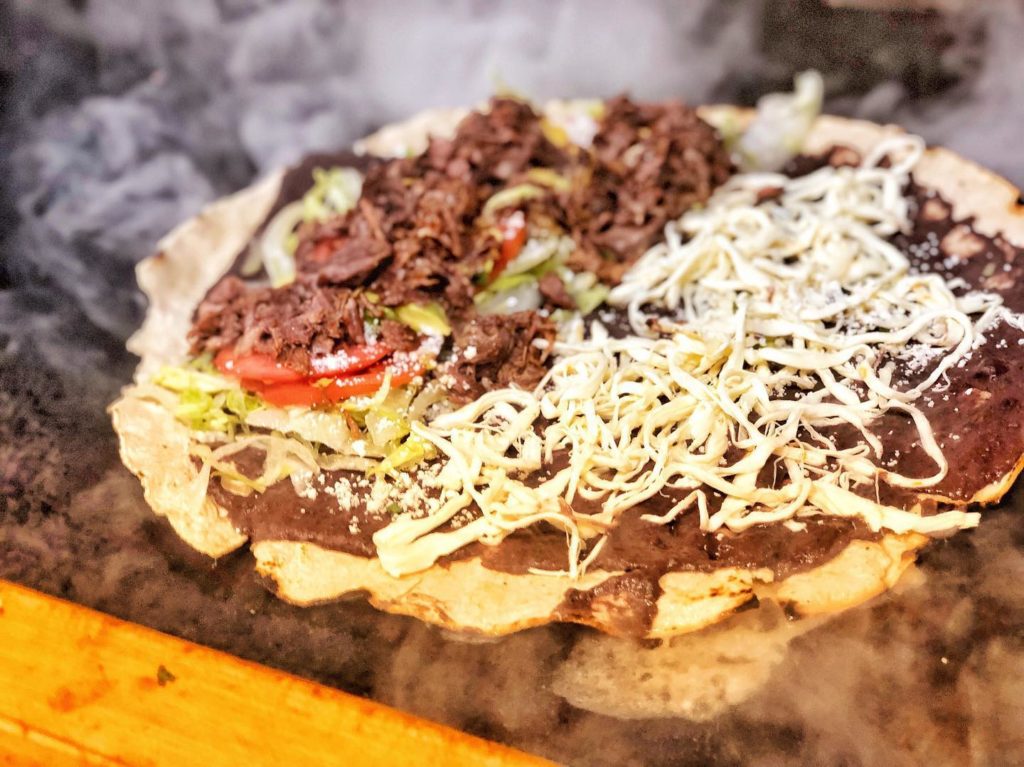 Tlayuda (Mexican pizza) from Lucha Sabina food truck in Roseland. (Courtesy of Lucha Sabina)