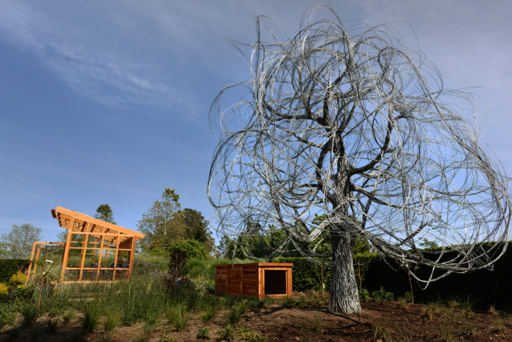From left, the green house, a compost box and a wire tree that was incorporated into the new Sunset Test Gardens at Cornerstone Sonoma on Arnold Drive in Sonoma. May 2, 2016. (Photo: Erik Castro/for The Press Democrat)
