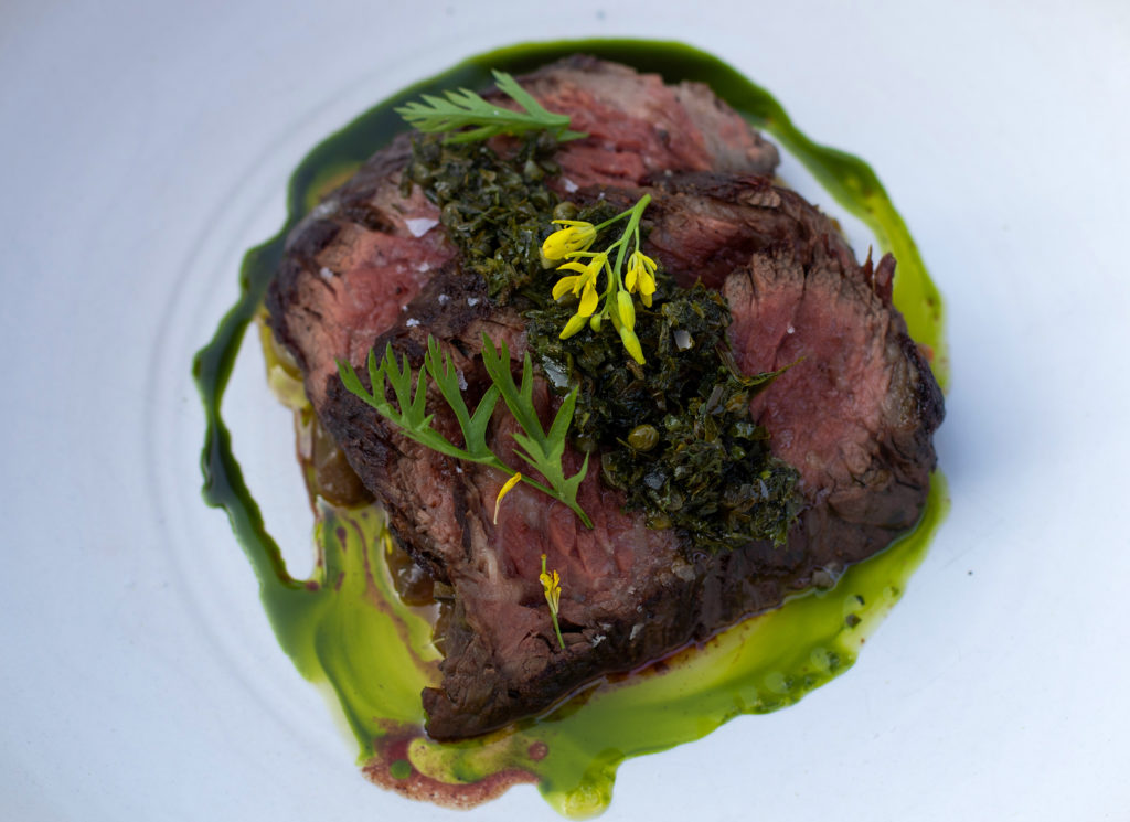 Grilled Snake River Farms bavette steak with summer squash caponata, carrot top salsa verde at Bricoleur Vineyards. Heather Irwin/PD