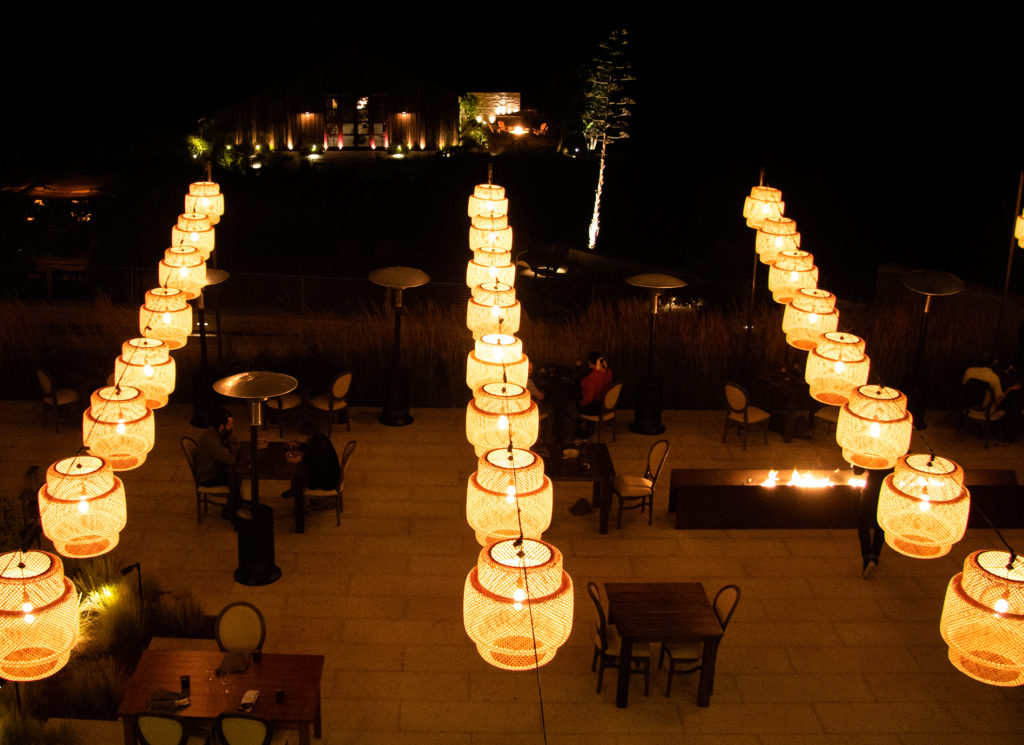 Lamps light the outdoor patio for Single Thread at Kistler Vineyards' Trenton Roadhouse. Heather Irwin/PD